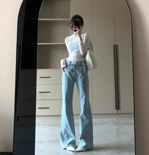 Джинсы клеш на высокой посадке