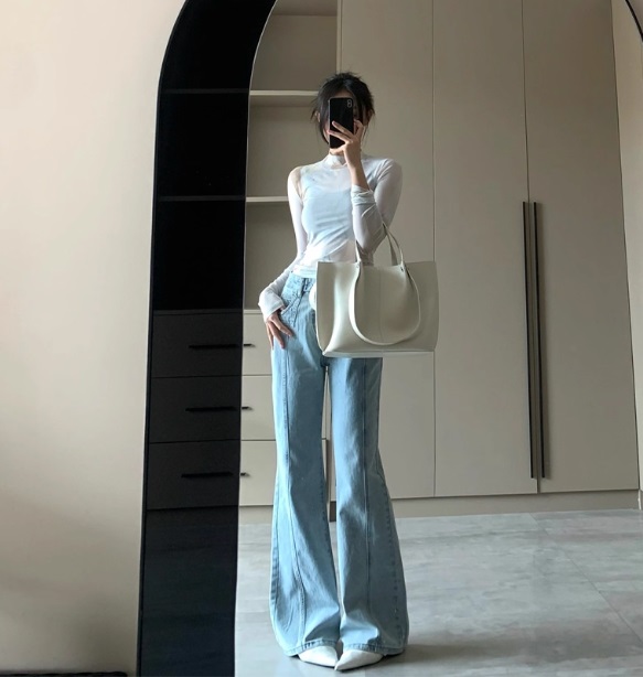 Джинсы клеш на высокой посадке